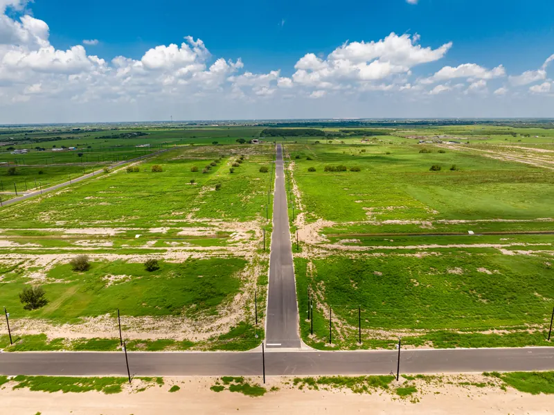 Wide aerial of Vista Ridge Acres and the Rio Grande Valley farmland